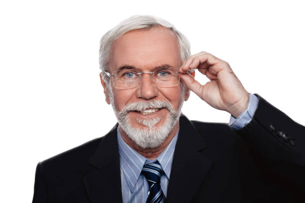 istock Senior handsome man with eyeglasses isolated on white 1137094717