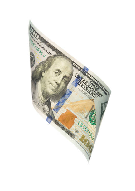 istock flying banknote of hundred dollars isolated on white 1137096950