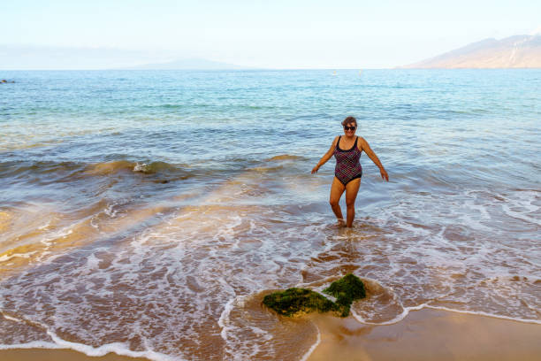 istock Senior Hispanic woman on Maui beach 1137098027