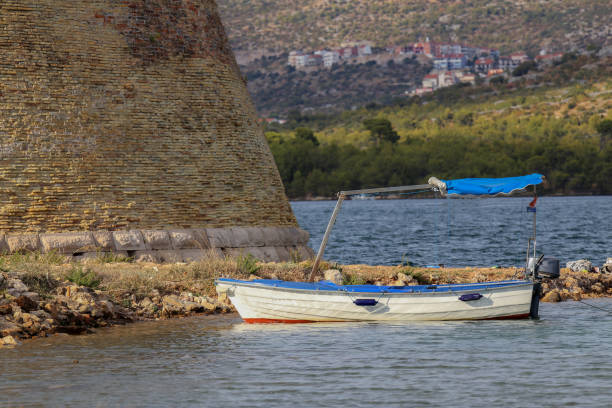 istock Fishing boat on the beach 1137098384