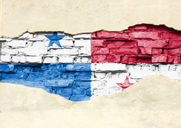 istock National flag of Panama on a brick background. Brick wall with partially destroyed plaster, background or texture. 1137101436