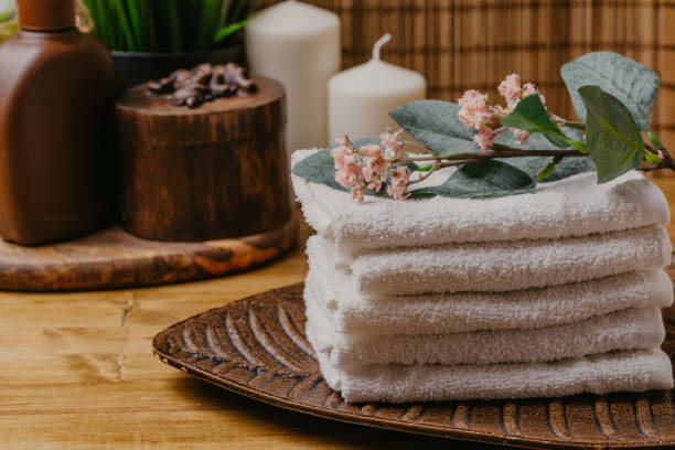 istock Spa still life with aromatic candles, flower and towel. - Image 1137102812