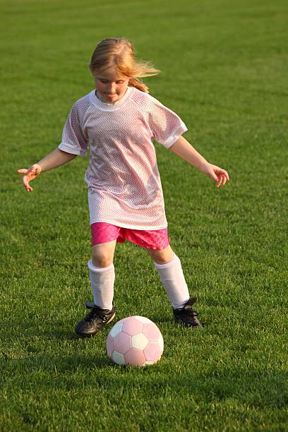 istock girl playing soccer 113710283