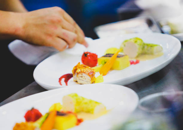 istock Chef preparing food, meal, in the kitchen, chef cooking, Chef decorating dish 1137106851
