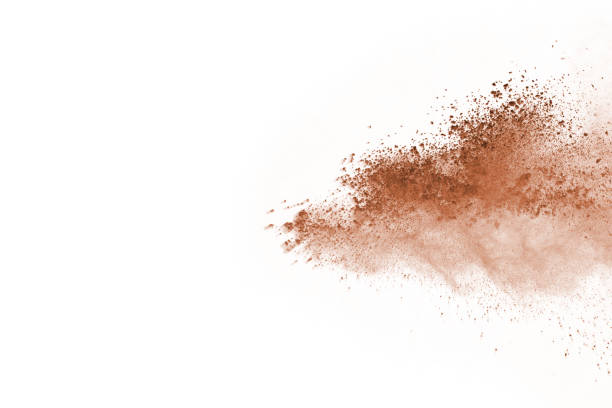 istock Brown color powder explosion on white background. Colored cloud. Colorful dust explode. Paint Holi. 1137110132
