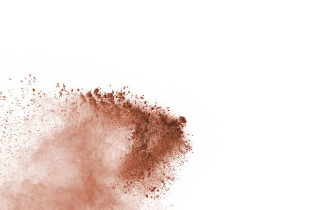 istock Brown color powder explosion on white background. Colored cloud. Colorful dust explode. Paint Holi. 1137110146