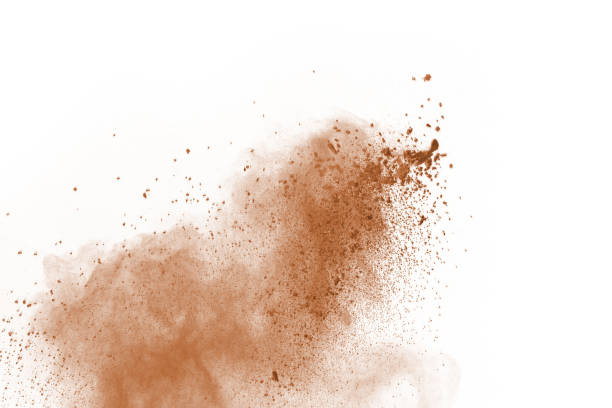 istock Brown color powder explosion on white background. Colored cloud. Colorful dust explode. Paint Holi. 1137110169