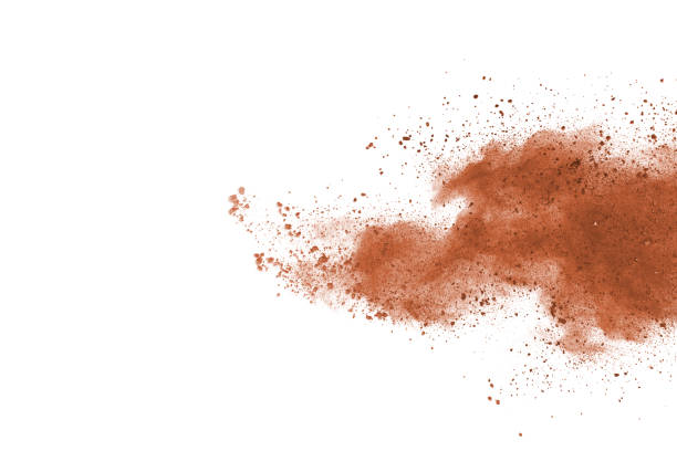 istock Brown color powder explosion on white background. Colored cloud. Colorful dust explode. Paint Holi. 1137110214