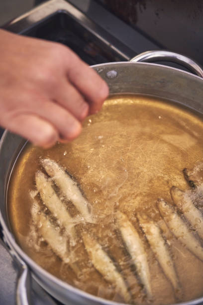 istock Frying Crispy Smelt Fish in Deep Oil 1137113077