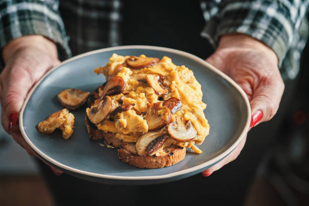 istock Egg Omelet with Mushrooms with Brown Bread 1137113102