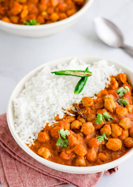 istock Chickpea Curry with Rice Vertical Photo 1137114615