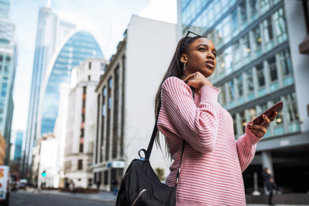 istock African tourist with backpack in Europe, using GPS device. 1137114981