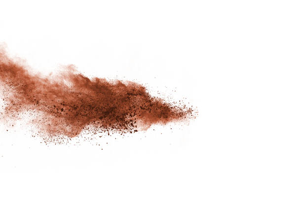 istock Brown color powder explosion on white background. Colored cloud. Colorful dust explode. Paint Holi. 1137115589