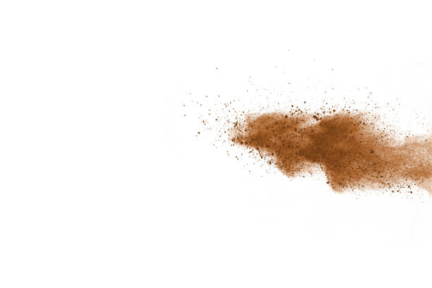 istock Brown color powder explosion on white background. Colored cloud. Colorful dust explode. Paint Holi. 1137116119