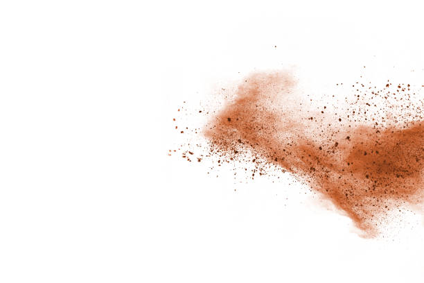 istock Brown color powder explosion on white background. Colored cloud. Colorful dust explode. Paint Holi. 1137116129