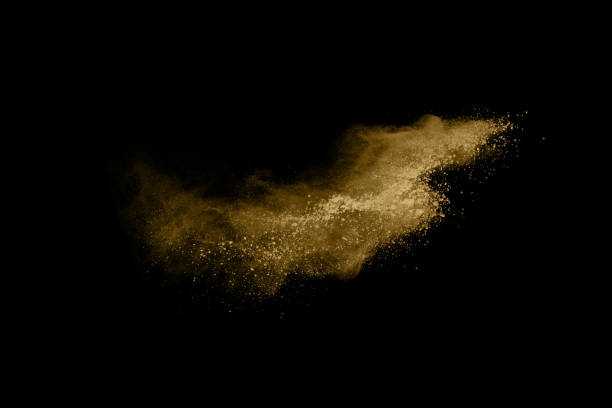 istock Golden powder explosion on black background. Freeze motion. 1137116301