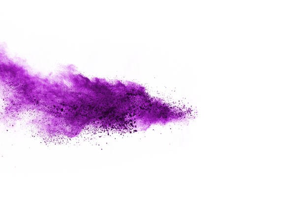 istock Powder explosion. Closeup of a purple dust particle explosion isolated on white. Abstract background. 1137116384