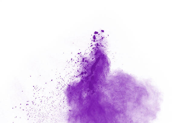 istock Powder explosion. Closeup of a purple dust particle explosion isolated on white. Abstract background. 1137116421