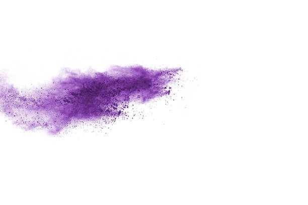 istock Powder explosion. Closeup of a purple dust particle explosion isolated on white. Abstract background. 1137116429