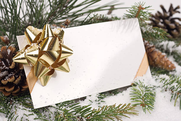 Christmas composition with golden greeting card, blank. Xmas glittering ball, decorations. Christmas, New Year, winter concept.