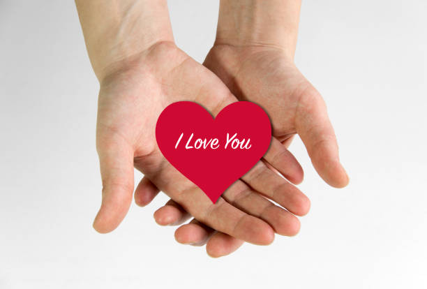 istock Red heart holding in hands 1137118988
