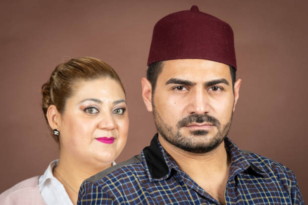 istock Middle eastern man posing with his wife 1137119290
