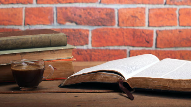 istock Holy Bible on a wood table 1137119871