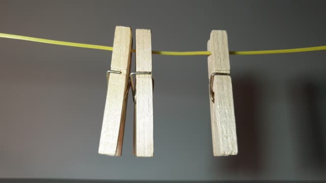 Clothes pegs made of wood. Wooden clothes pegs