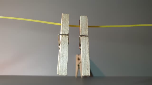 Clothes pegs made of wood. Wooden clothes pegs