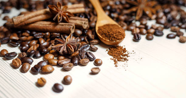 istock Coffee and spices on a light wooden table 1137125583