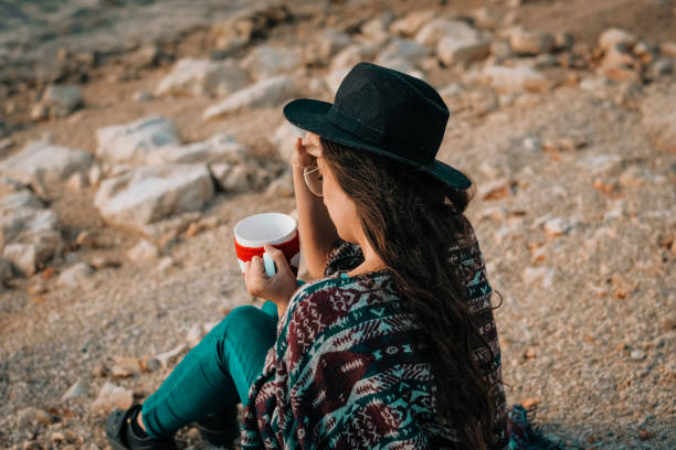 istock Pretty woman with hot drink 1137126685