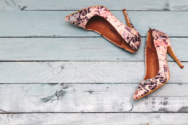 istock floral pump hight heeled on blue wood table 1137129695