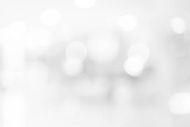 istock Abstract blurred soft white and gray silver beautiful of interior workplace with glowing exposure bokeh background for design banner  and presentation concept 1137130030