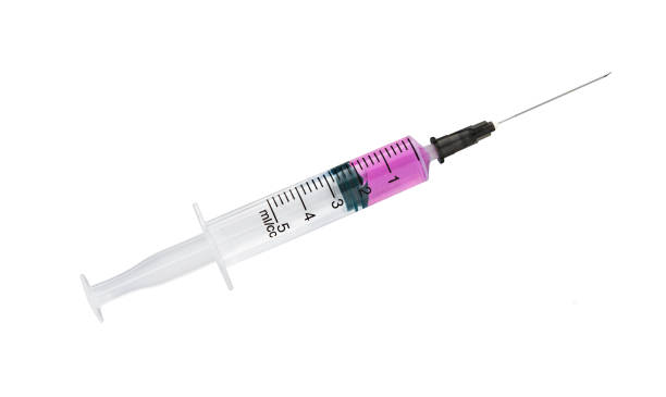 istock Syringe close-up. Medical syringe isolated 1137137417