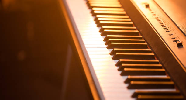 istock piano keys close-up, on a beautiful colored background 1137140702