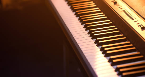 istock piano keys close-up, on a beautiful colored background 1137140726