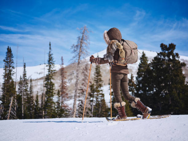 istock Woman Winter Snowshoeing Explorer 1137144858