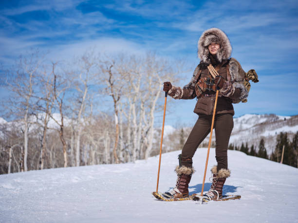 istock Woman Winter Snowshoeing Explorer 1137145518