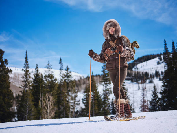istock Woman Winter Snowshoeing Explorer 1137145519