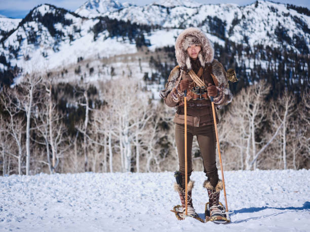 istock Woman Winter Snowshoeing Explorer 1137145749
