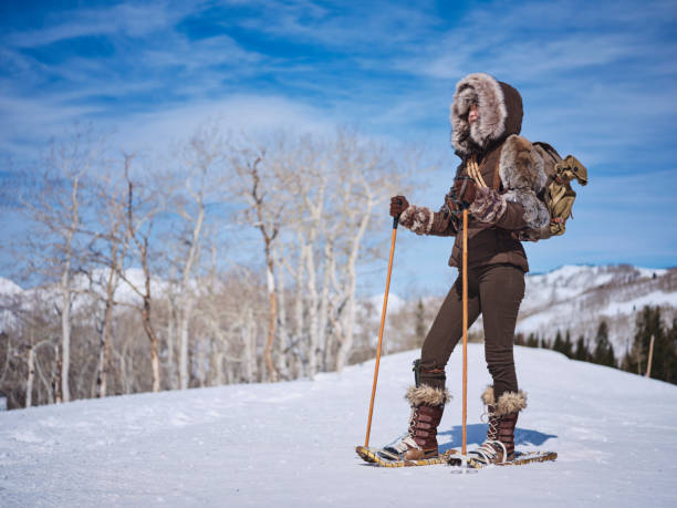 istock Woman Winter Snowshoeing Explorer 1137146005
