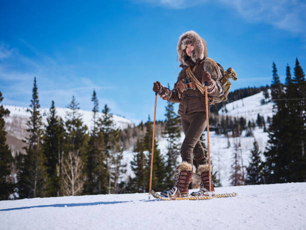 istock Woman Winter Snowshoeing Explorer 1137146397