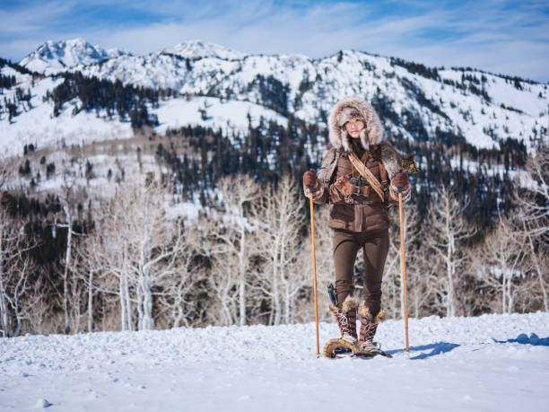 istock Woman Winter Snowshoeing Explorer 1137146398
