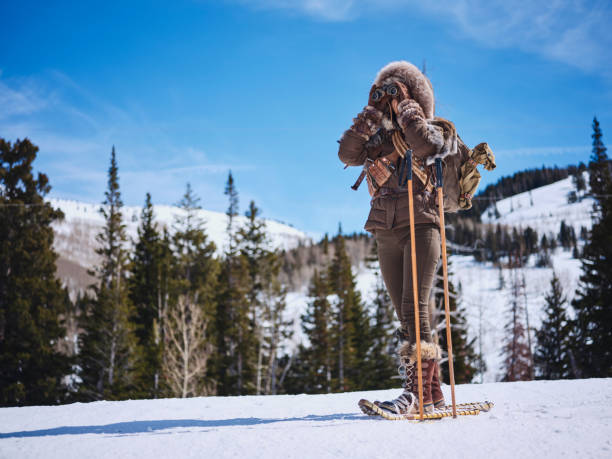 istock Woman Winter Snowshoeing Explorer 1137146477
