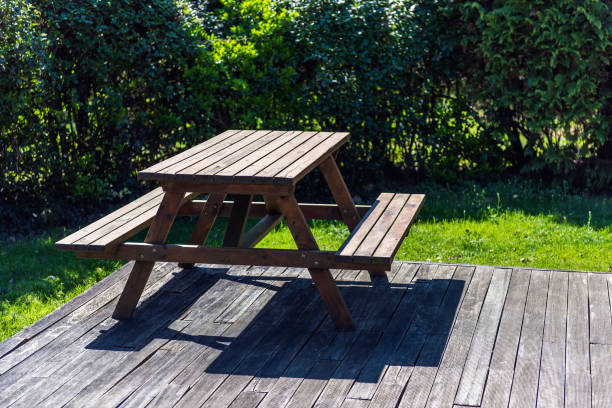 istock Wooden picnic table in garden 1137148659