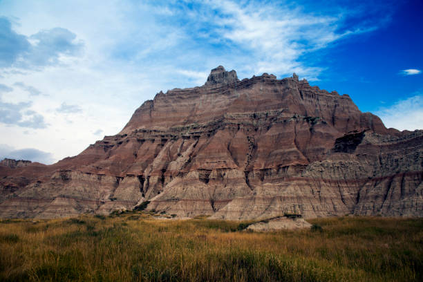 istock Eroding Cliffs and Prairie Grass in Badlands National Park, South Dakota 1137154758