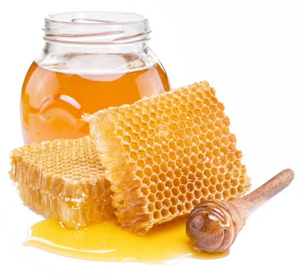 istock Jar full of fresh honey and honeycombs. 1137161836