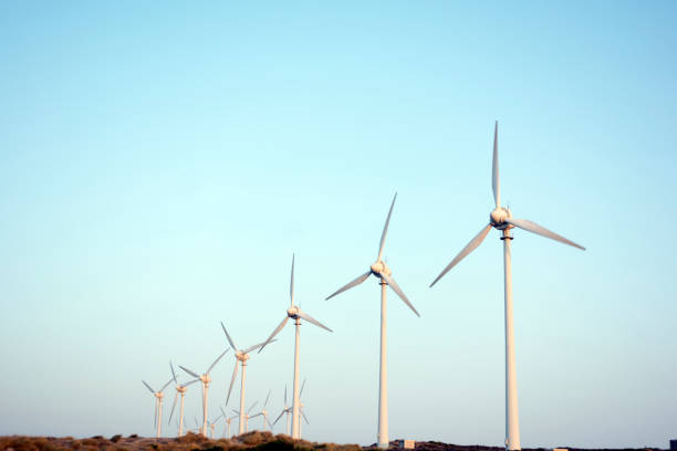 istock Rocky seashore and Wind turbines 1137172230