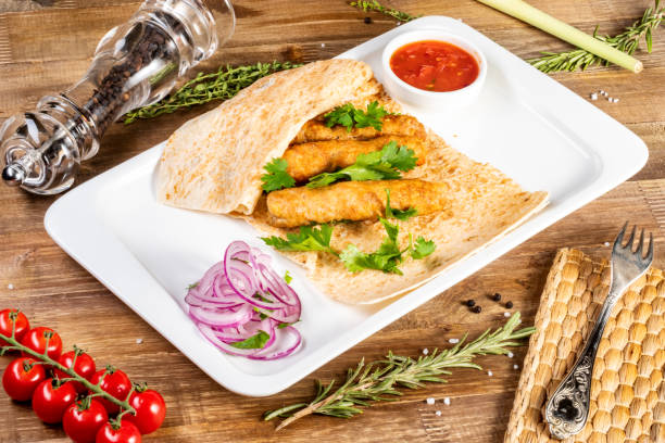 istock The fried meat pieces with sauce and parsley. 1137174803