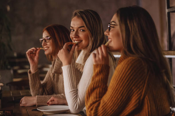 istock Women enjoying snack in a restaurant 1137175061